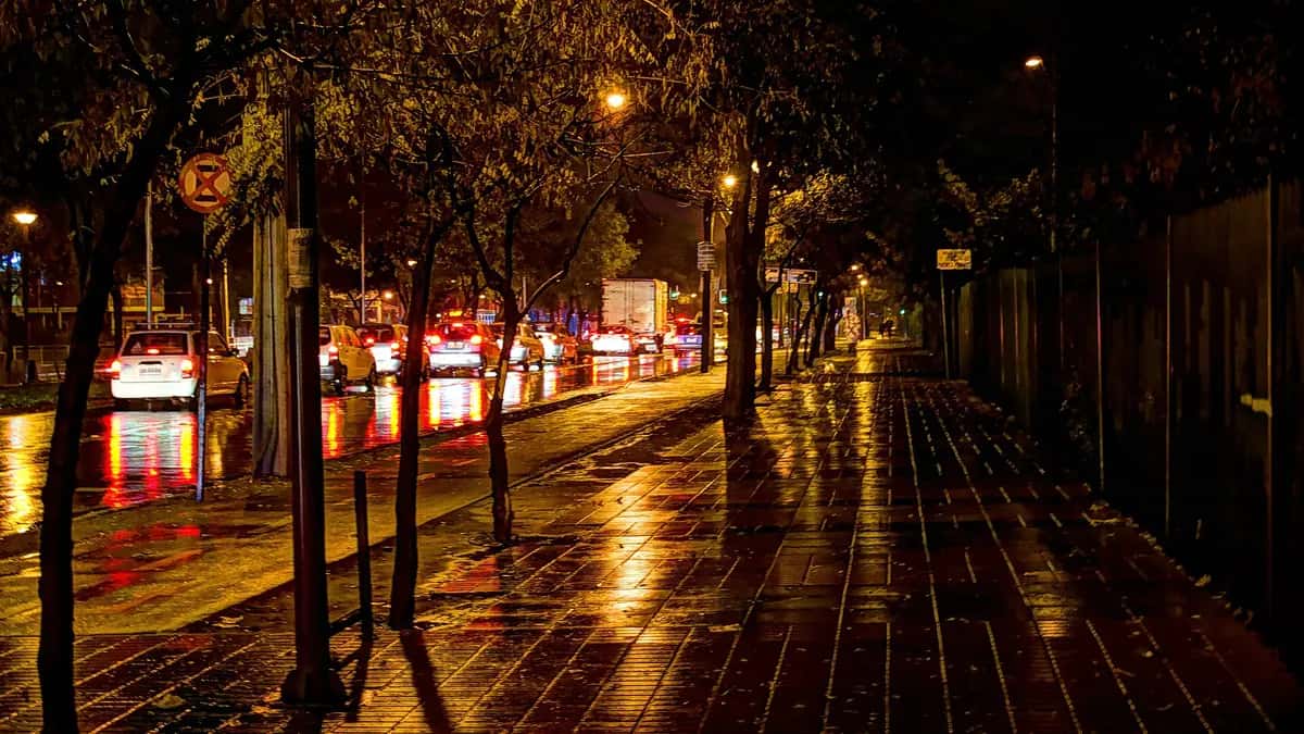 Santiago street at night in the rain