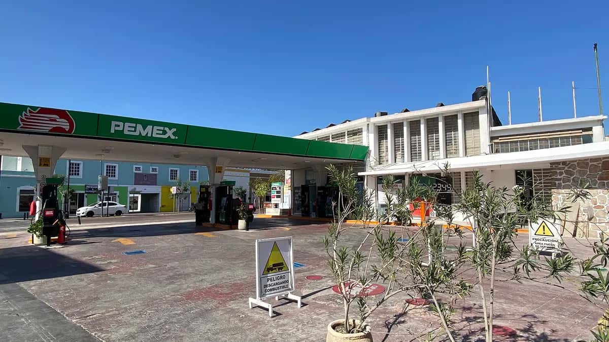 Pemex gas station in Mexico with pumps and a green canopy
