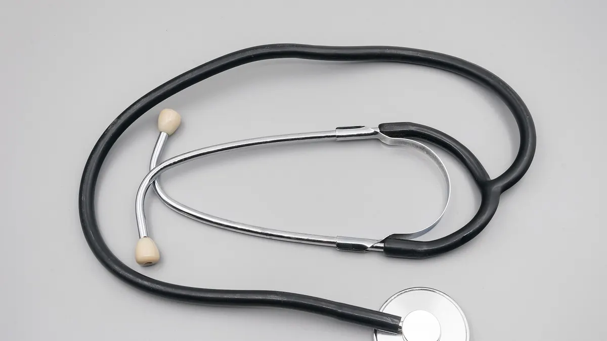 Stethoscope on a grey background