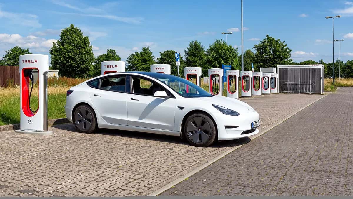 Tesla Model 3 charging at a Supercharger station