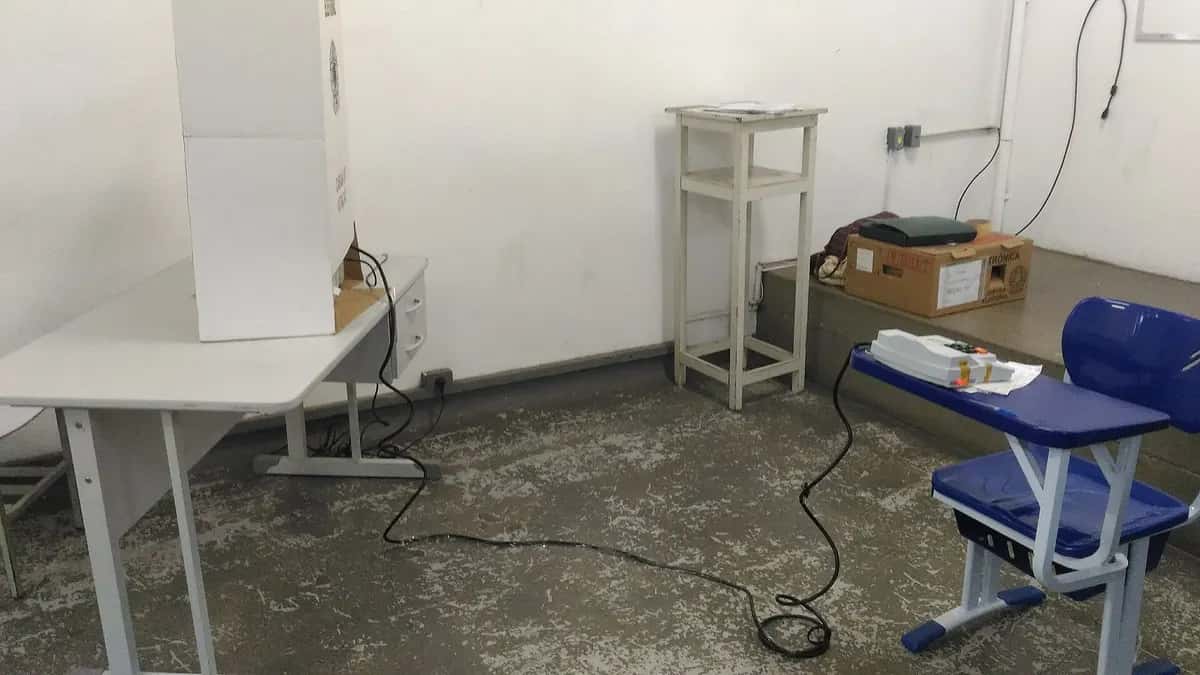 Electronic voting machine and voting booth at a polling place in Brazil