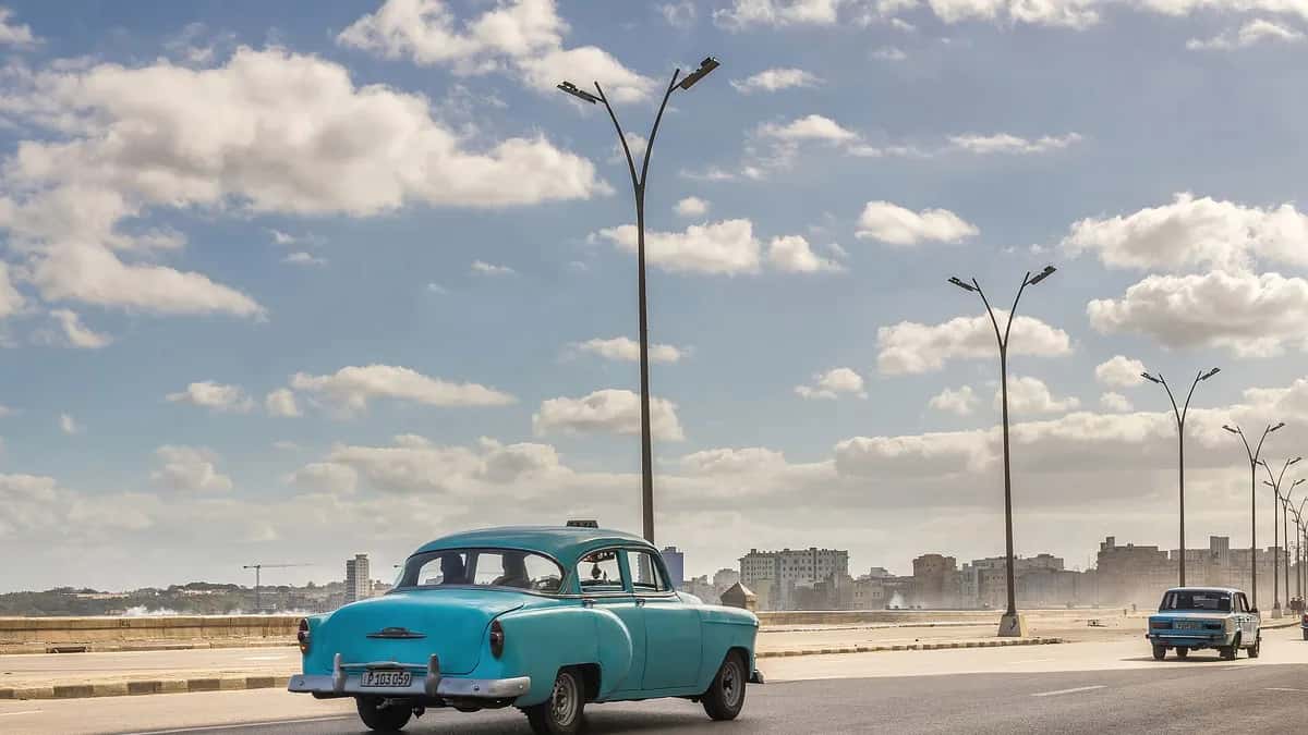 Malecón avenue in Havana with a vintage car