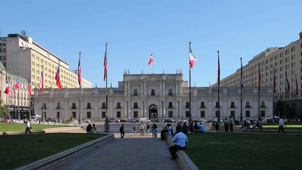 La Moneda Palace in Santiago with Chilean flags